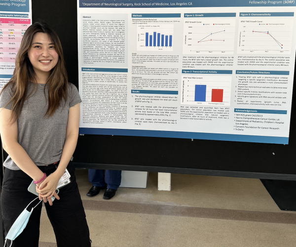 Student in front of USC/CHLA Summer Oncology Research Fellowship Program Program